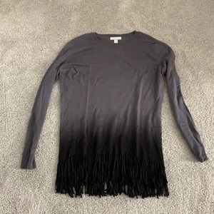 Gray and black sweater with frayed bottom